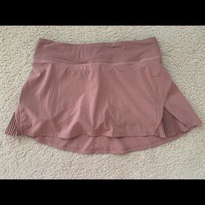 Play Off The Pleats Mid Rise Skirt